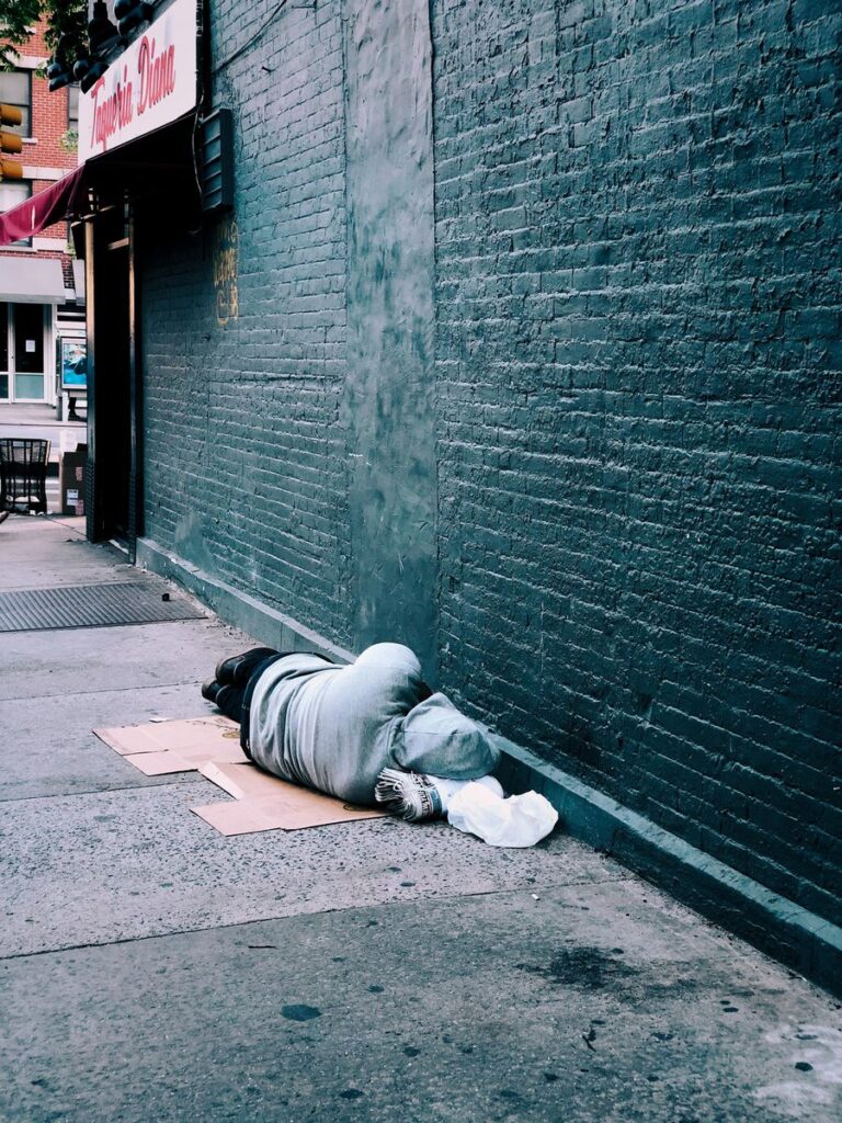 homeless man laying